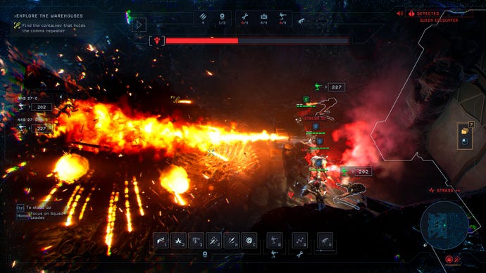A group of soldiers unleashes a flamethrower over a giant xenomorph in Aliens Dark Descent