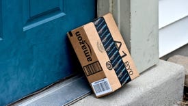 An Amazon box left on a doorstep.