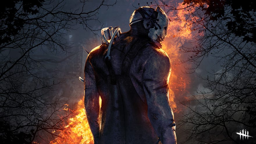 A masked killer faces away from the viewer, towards a fiery forest.
