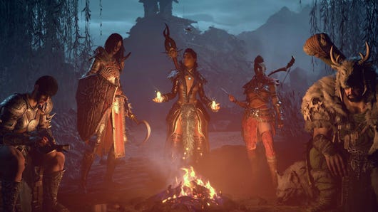 Diablo 4 screenshot showing the five classes sat around a campfire (left to right: Barbarian, Necromancer, Sorcerer, Rogue, Druid).